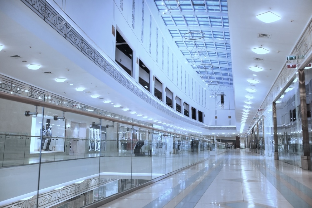 Image of the interior hallway of a shopping mall.