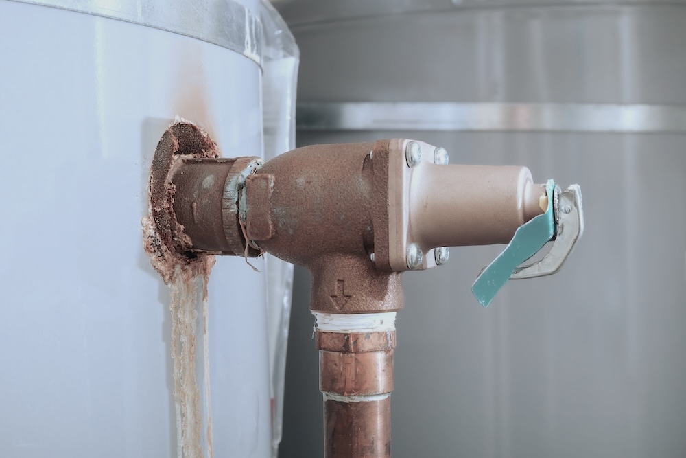 Image of a water tank leaking water.